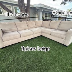 beige L-shaped sofa  Ashley Furniture