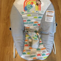 Bright Starts Playful Paradise Vibrating Baby Bouncer.