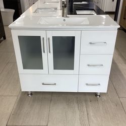 40” vanity, white, ceramic top, available for pick up