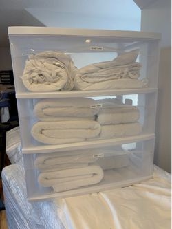 Sheets, towels, and carrier