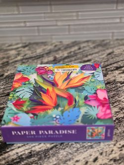 "PAPER PARADISE" 500PC JIGSAW PUZZLE.   POSTER INCLUDED.  DONE ONCE.