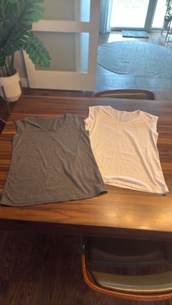 Gray and white cap sleeve t shirts size large