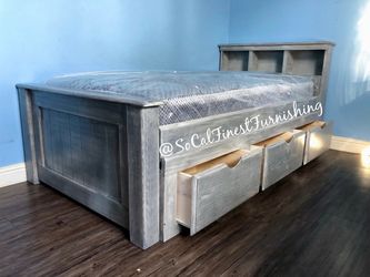 New twin bed with mattress and drawers