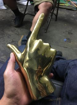 Hd buttercup brass hand sculpture
