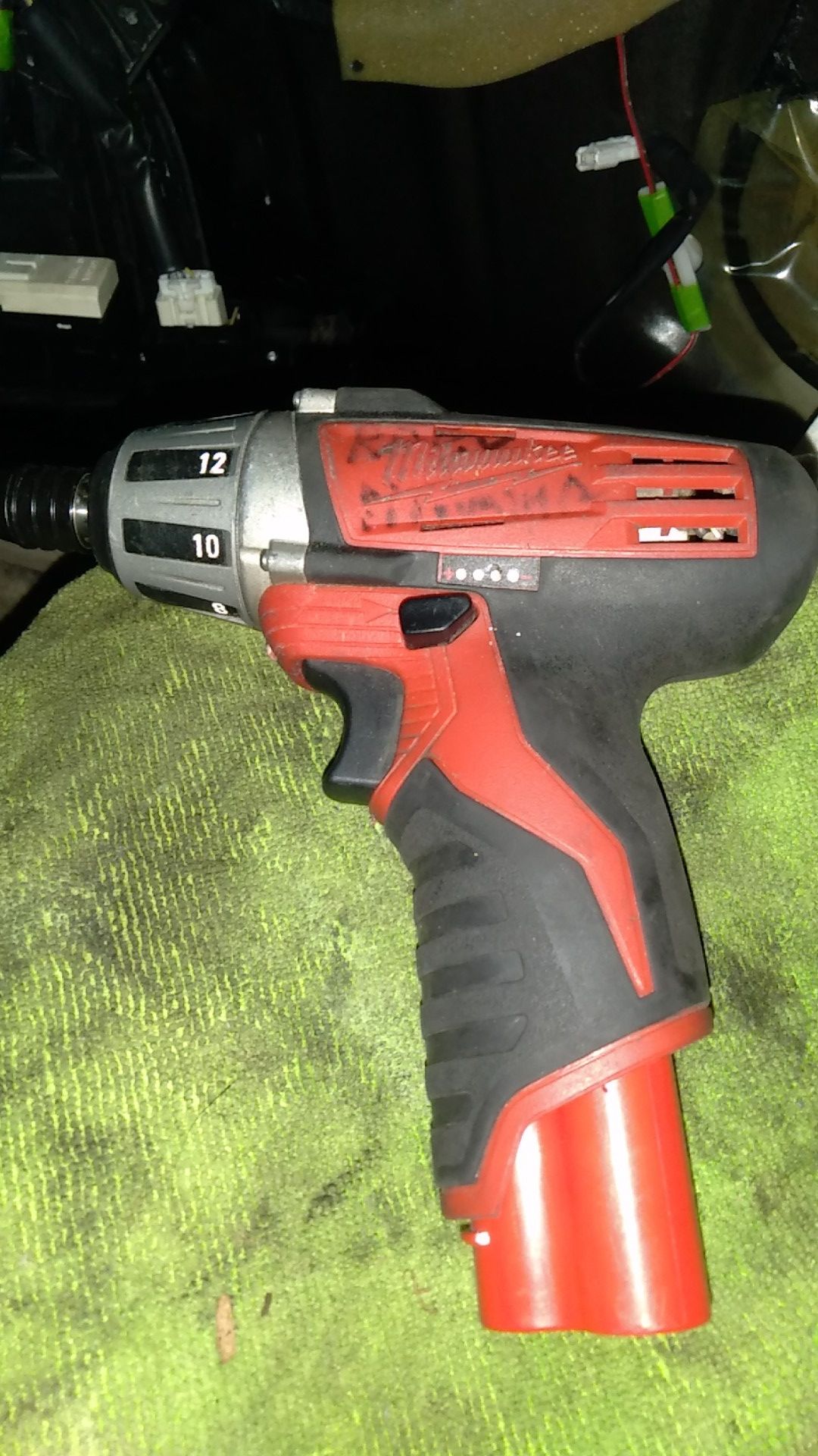 Milwaukee m12 drill driver will come with battery no charger works great