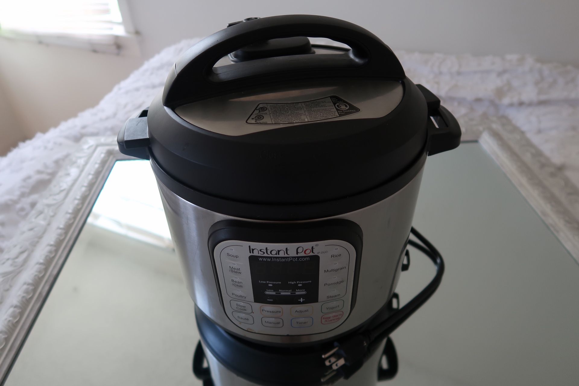 Instant Pot Duo in Electric Pressure Cooker, Sterilizer, Slow