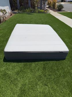 Queen bed frame and mattress.