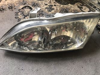 99-01 LEXUS headlights and Grill 80. OBO