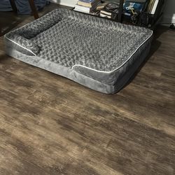 Large orthopedic dog bed and toys. Fairly new