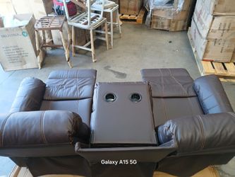 Sofa recliner with cup holders