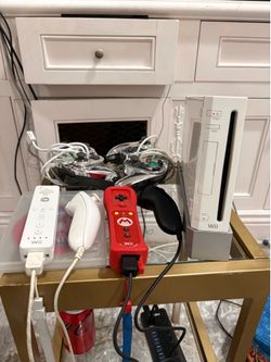Nintendo Wii Bundle + Mario Remote + Wii Carnival