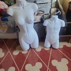 Two Hanging Maniquins