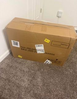 Amazon Kassipo Criss Cross Legged Office Chair with Wheels and Flip-Up Arms, Upholstered Criss Cross