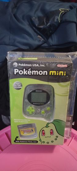 Pokémon Mini handheld console bundled with Pokémon Party mini