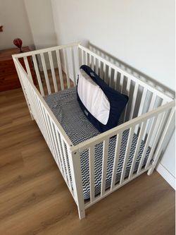 Crib very sturdy and home made by our neighbor who is an engineer