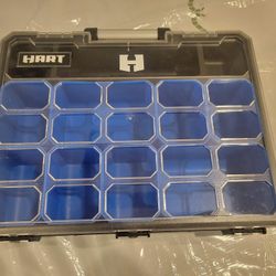 Black and blue plastic organizer with multiple compartments.