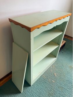 Vintage wooden bookcase with scalloped trim, adjustable shelves