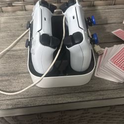 2 PlayStation 5 Controllers And A Charging Port (charger Included)