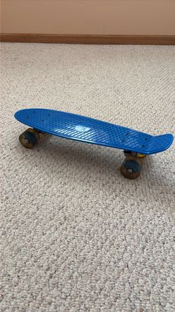 Skate board with wheels light up when in motion