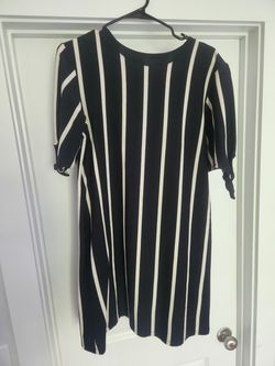 Assorted women's dresses.  Mostly small