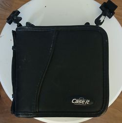 Black leather case it cd/dvd carry binder holds 26 cds or dvd used but in good condition