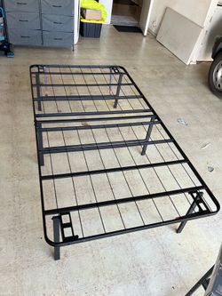 Folding twin mattress frame/bed