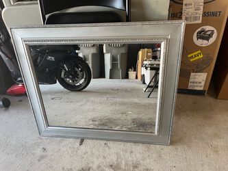 Mirror and frame