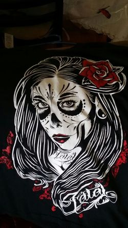 2 Fatal Tattoo shirts.