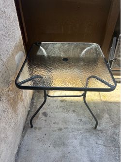 Outdoor table with two chairs