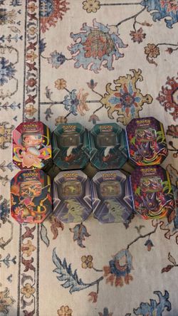 Pokemon sealed tin lot