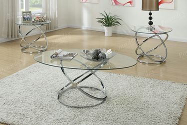 Brand new 48" x 26" oval glass coffee table