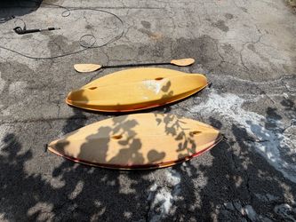 Two Kayaks With Double-Sided Paddle