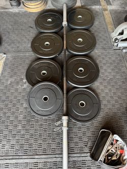 Torque bumper rubber weights 230lbs total plus 7ft 45lbs bar