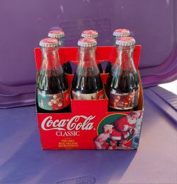 1995, Christmas 6 pack of Coca-Cola Classic bottles sealed.