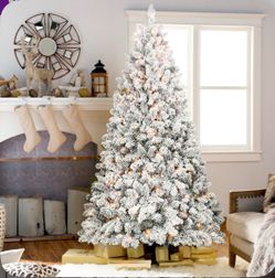 9ft flock Christmas tree with pine cones✨