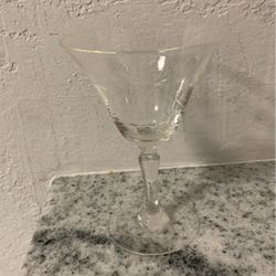 Antique wine glasses  Seven of them with hand printed flowers on them