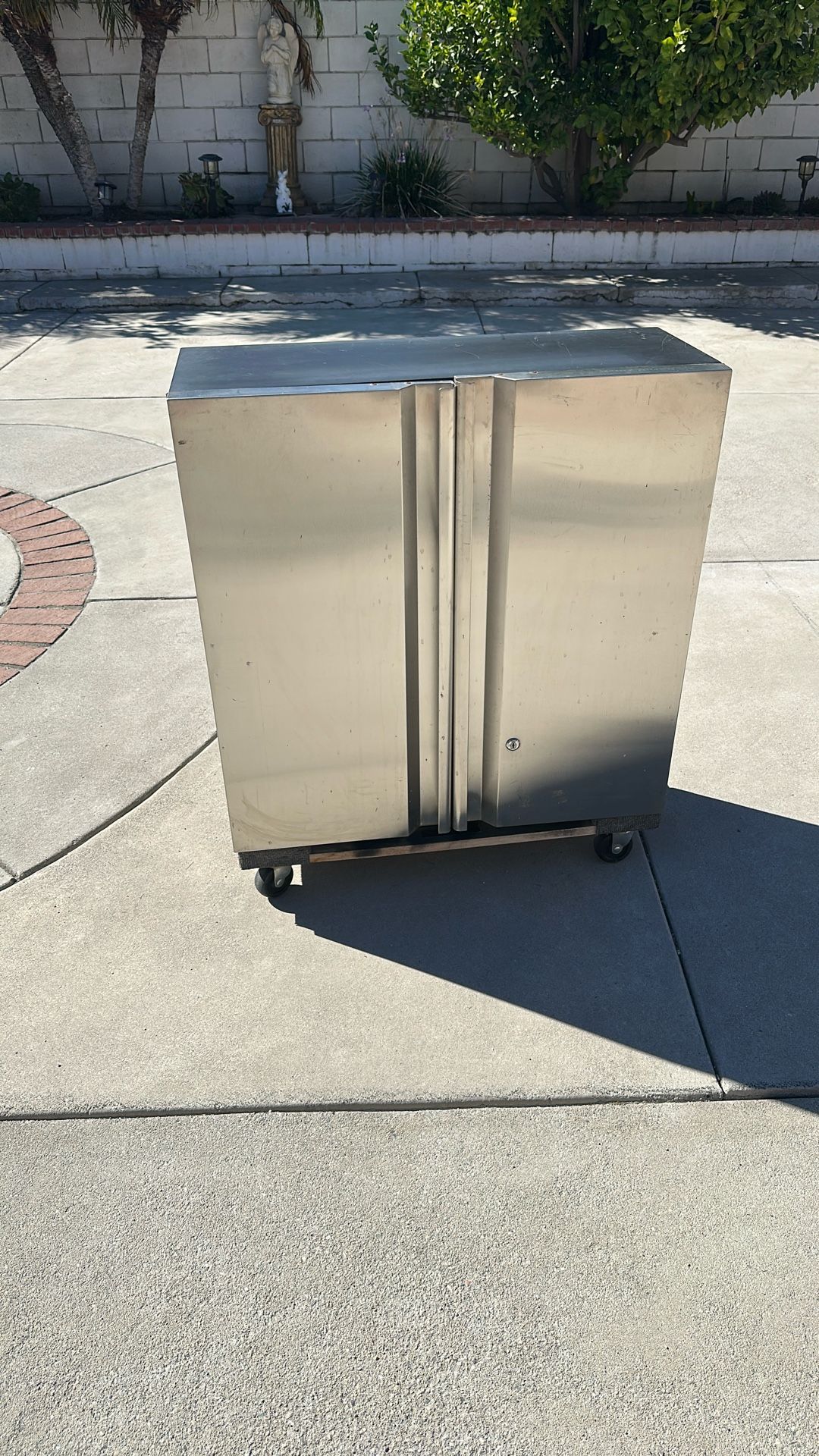 THIS IS A SMALL STORAGE FOR TOOLS PAINT OR YOU DESIDE TO USED IT FOR BRAND SEARS CO.the Measurements are 30 in tall 30 in Wide and 12 in deep