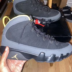 Jordan 9s “Dark Charcoal University Gold”