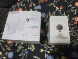 Wyze indoor camera and cover/mount for outdoor
