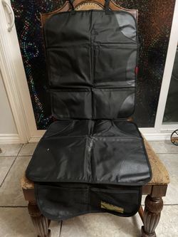 Car Seat Seat Protector With Storage That Will Also Protect The Back Of Your Front Seat