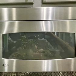 Stainless Steel GE Profile Microwave- Turns on; Non- Functional