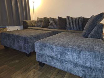 Grey sectional sofa + Ottoman -$700