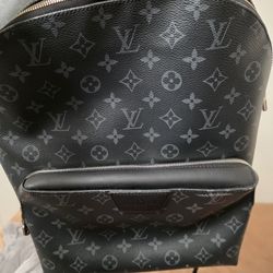 Louis Vuitton
Monogram Eclipse Discovery Backpack PM
