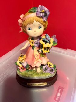Montefiori Collection Girl Figurine with Flowers