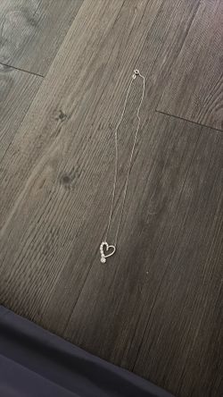 Silver Heart With Zirconias In It