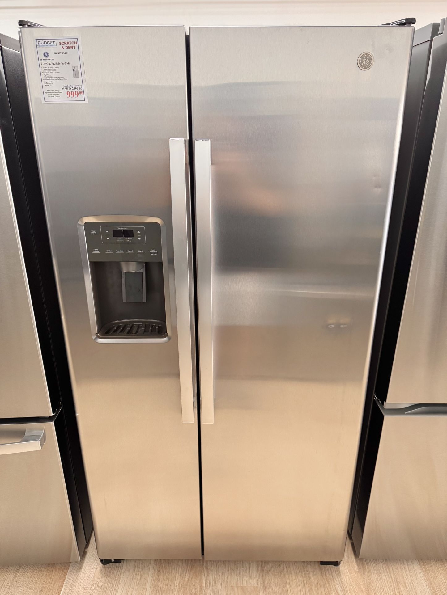 New GE 21.9 Cu. Ft. Counter-Depth Side-By-Side Refrigerator  Model #:GZS22DSJSS 