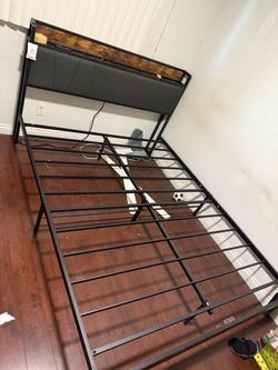 Queen size bed frame with charging station