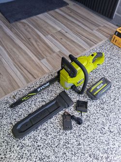 CHAINSAW RYOBI 40V BATTERY AND CHARGER INCLUDED