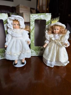 Porcelain Cracker Barrel Dolls