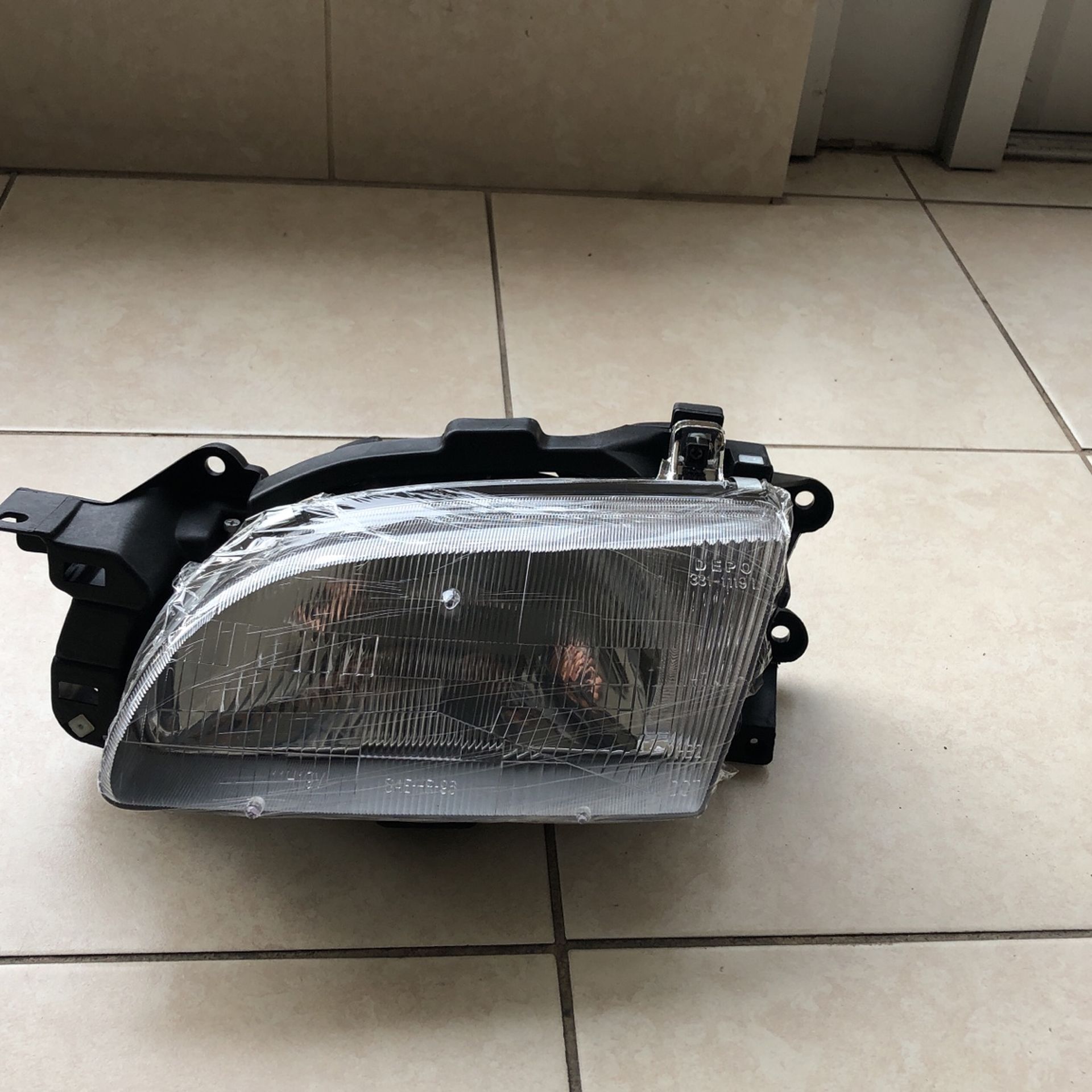 Ford Aspire 1994 To 1996 Headlight Driver Side Assembly